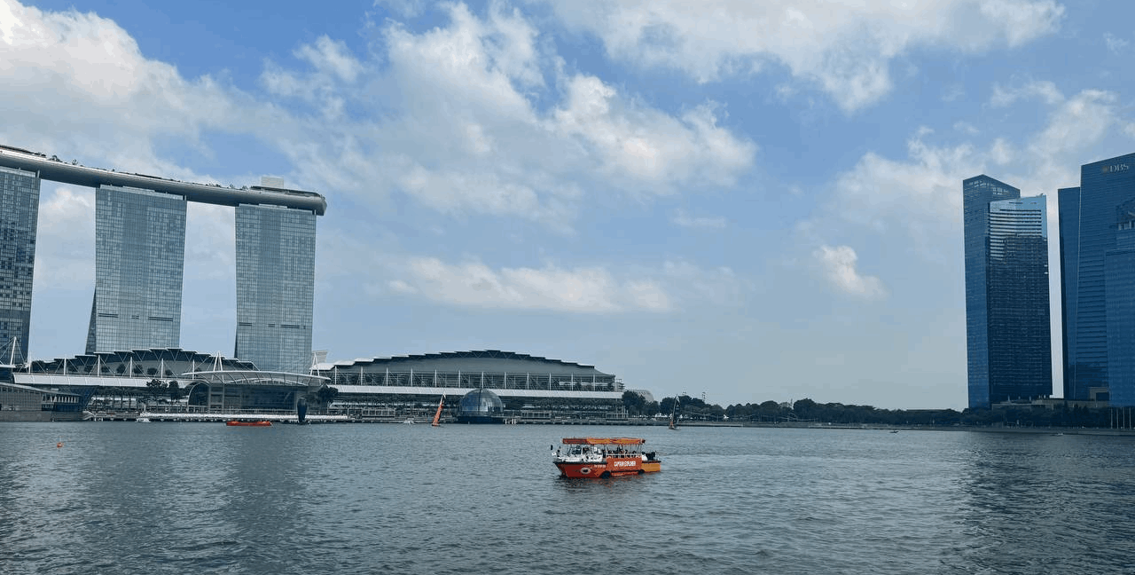 Captain Explorer DUKW Tour cruising across Marina Bay with views of Marina Bay Sands and the Singapore skyline.