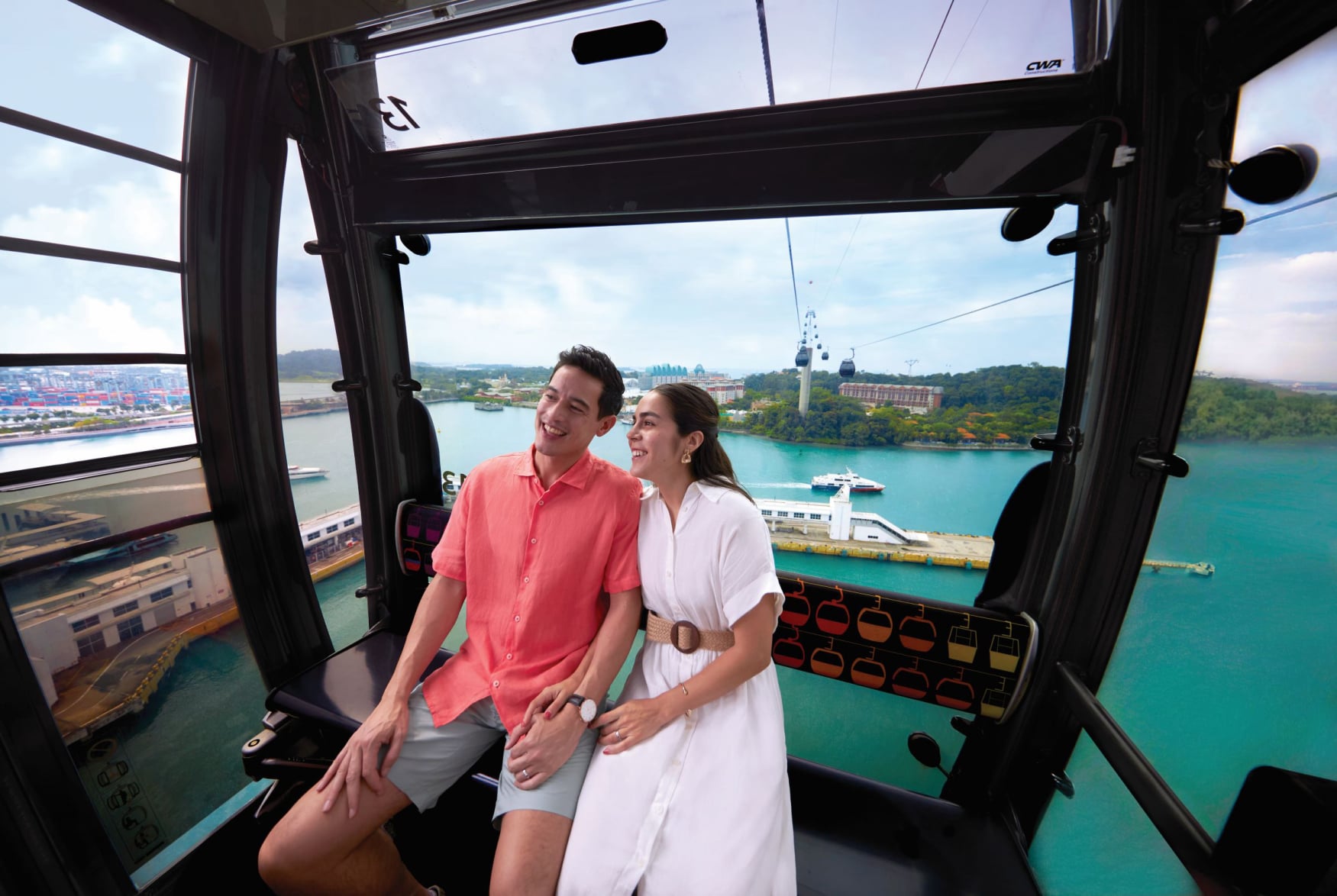 A scenic ride on the Sentosa Cable Car overlooking the island and city skyline.