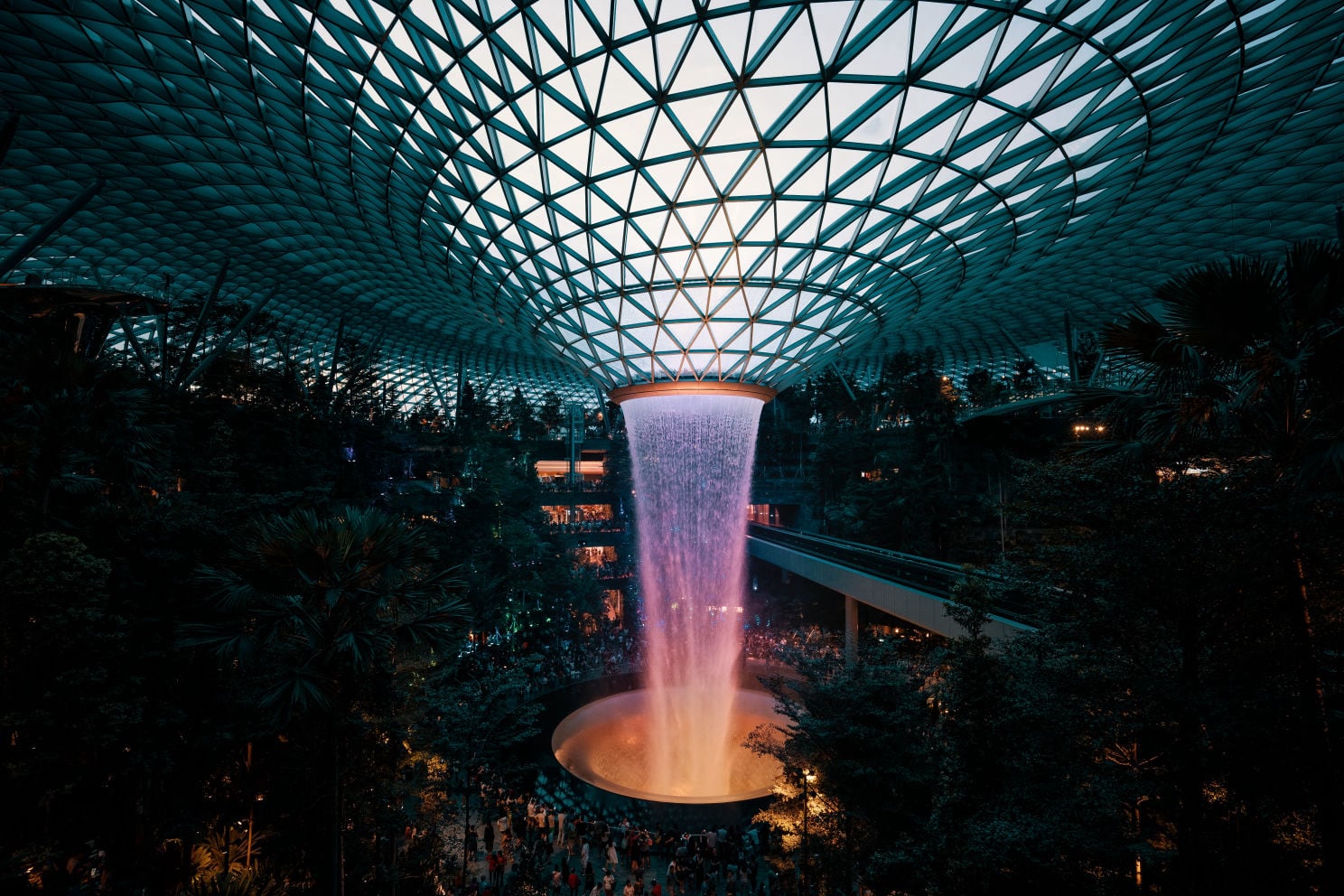 A stunning view of the Rain Vortex waterfall at Jewel Changi Airport.