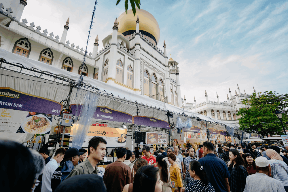 Explore the vibrant Kampong Glam Hari Raya Bazaar 2025 in Singapore with City Tours' FunVee Open-Top Bus, offering festive shopping and cultural experiences.