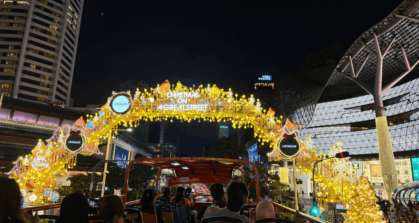 A night view of ION Orchard Singapore decorated with Christmas lights and Christmas tree.
