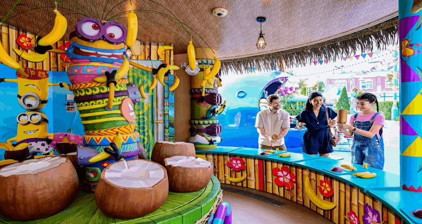 Family enjoying a colourful themed attraction at Universal Studios Singapore, a fun Sentosa stop for first-time visitors on a 3-day Singapore itinerary.