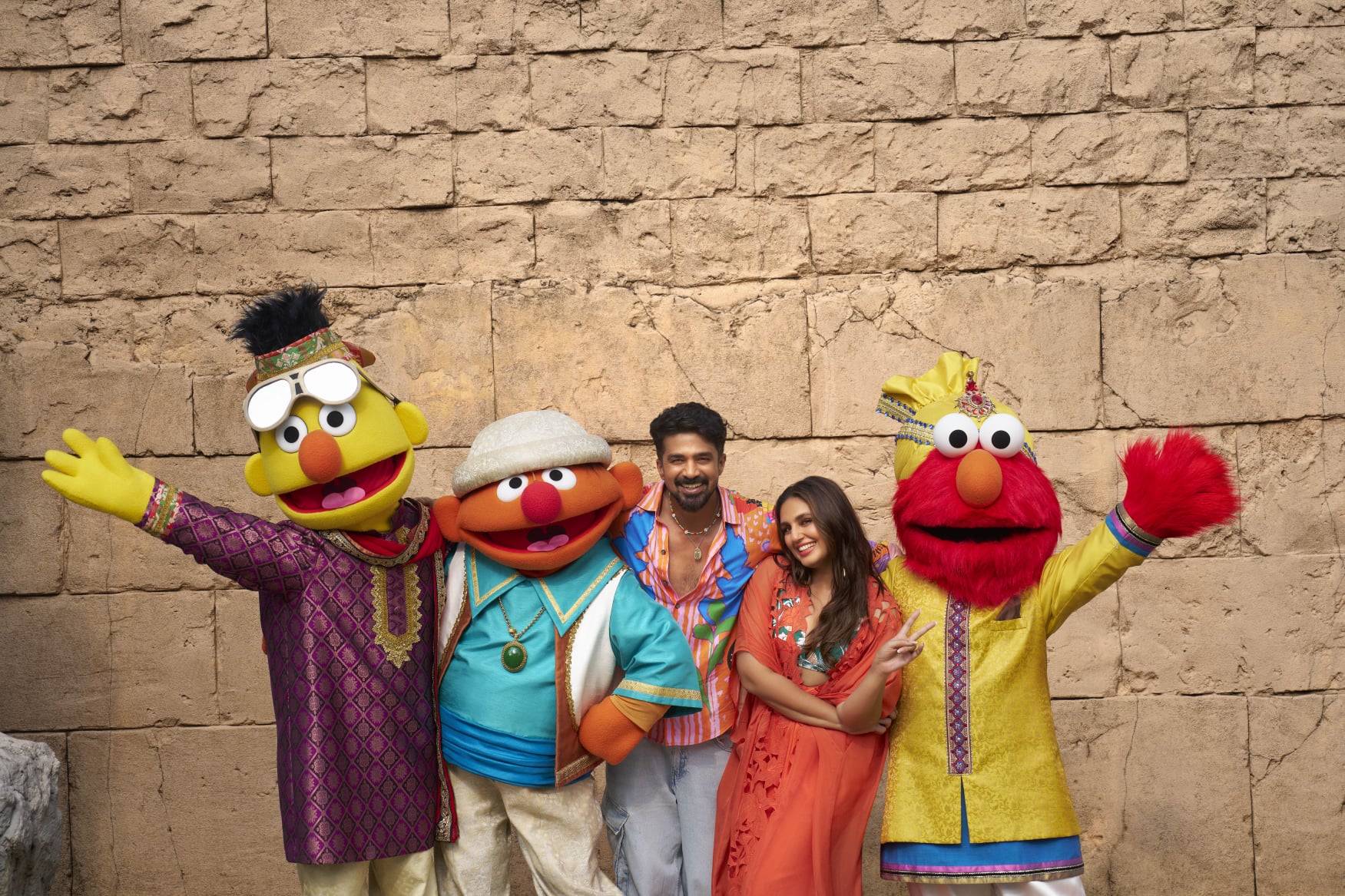 Indian family enjoying Sesame Street Goes Bollywood show at Universal Studios Singapore during summer holidays 2025