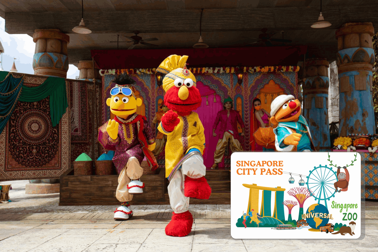 Sesame Street characters performing in colourful traditional costumes at Universal Studios Singapore during Great Singapore Sale